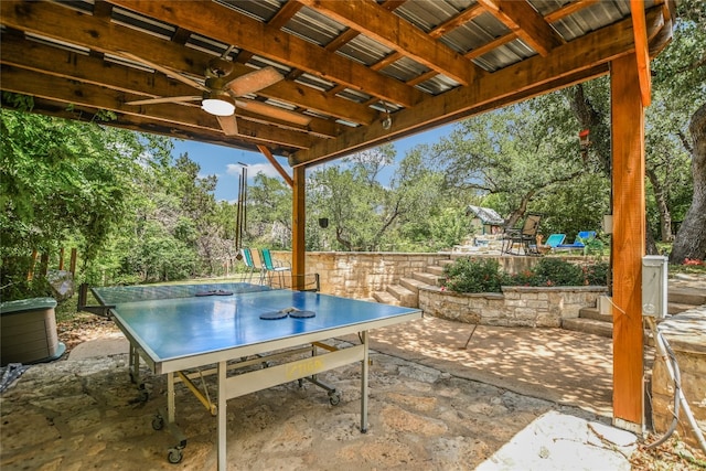 108 Tumbleweed Trl, Austin, TX 78733 - view of patio / terrace featuring a ceiling fan, outdoor dining area, and view of scattered trees