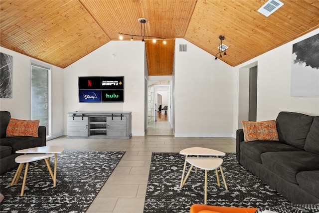 2106 Kenwood Ave, Austin, TX 78704 - living area with wooden ceiling, baseboards, tile patterned flooring, and high vaulted ceiling