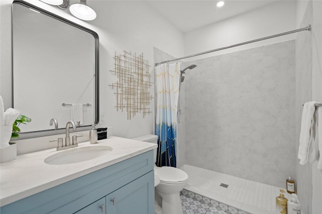 2106 Kenwood Ave, Austin, TX 78704 - bathroom with vanity, toilet, and tiled shower