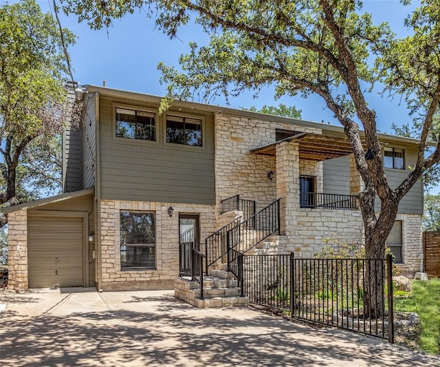 3005 Brass Buttons Trl, Austin, TX 78734 - view of front of home with stone siding and driveway