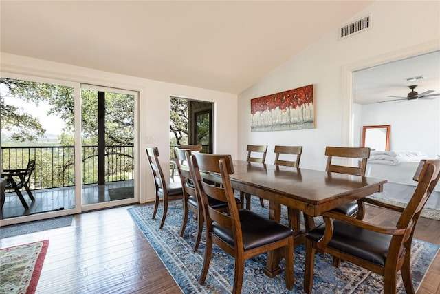 3005 Brass Buttons Trl, Austin, TX 78734 - dining space with vaulted ceiling and wood-type flooring