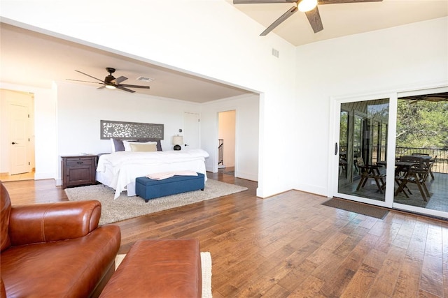 3005 Brass Buttons Trl, Austin, TX 78734 - bedroom with access to exterior, hardwood / wood-style flooring, a ceiling fan, a towering ceiling, and baseboards
