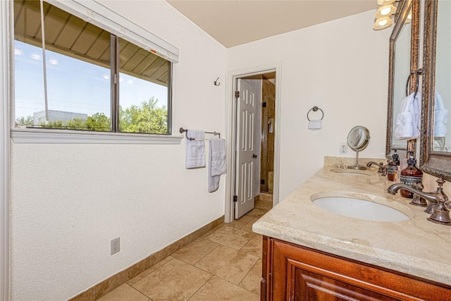3005 Brass Buttons Trl, Austin, TX 78734 - full bathroom featuring double vanity, baseboards, and tile patterned floors
