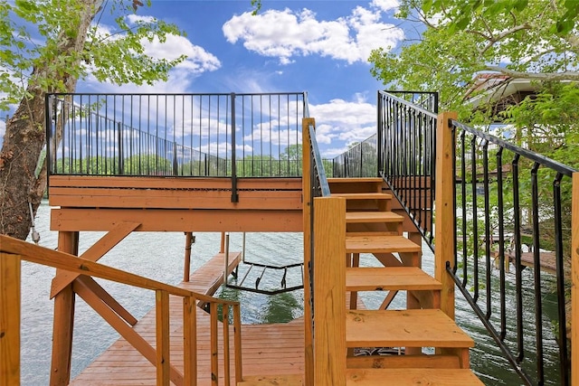 3005 Brass Buttons Trl, Austin, TX 78734 - wooden terrace featuring stairs, a water view, and a dock