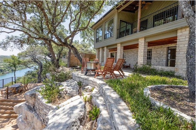 3005 Brass Buttons Trl, Austin, TX 78734 - view of yard featuring a patio and a water view