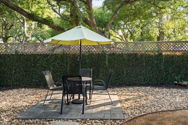 2612 Monarch Dr, Austin, TX 78748 - fenced backyard with a patio area and outdoor dining space