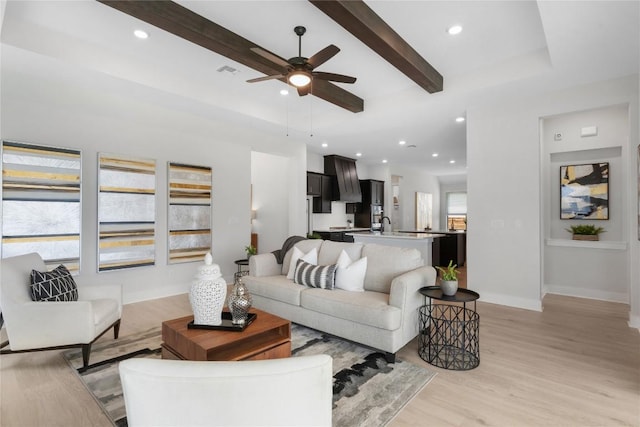 232 San Xavier St, Georgetown, TX 78633 - living area with ceiling fan, light wood-type flooring, beam ceiling, and recessed lighting
