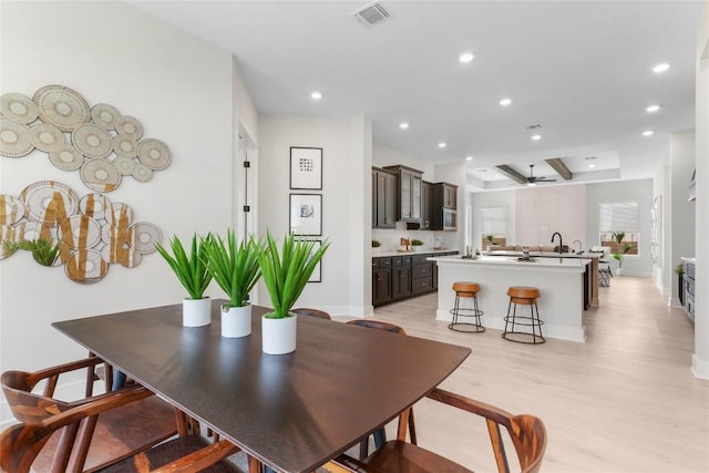 232 San Xavier St, Georgetown, TX 78633 - dining space with light wood-style flooring, a ceiling fan, recessed lighting, and baseboards