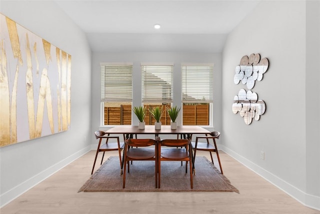 232 San Xavier St, Georgetown, TX 78633 - dining area featuring lofted ceiling, light wood-style floors, and baseboards