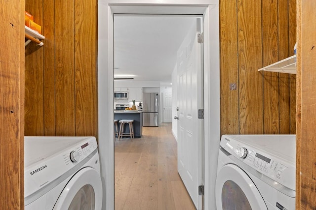 14406 Tucumcari Trl, Austin, TX 78734 - washroom featuring independent washer and dryer and light wood finished floors