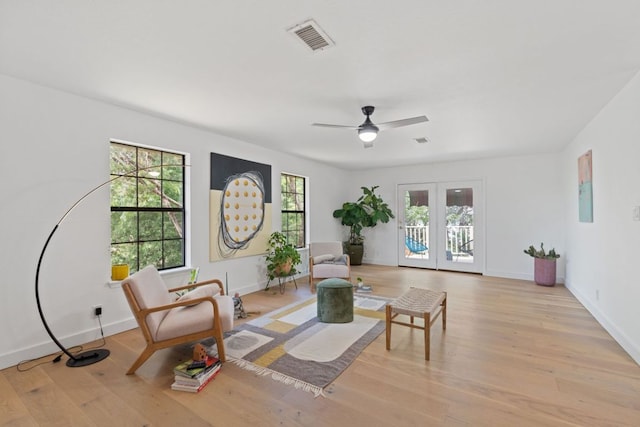 14406 Tucumcari Trl, Austin, TX 78734 - living area featuring light wood-style flooring, a ceiling fan, and baseboards