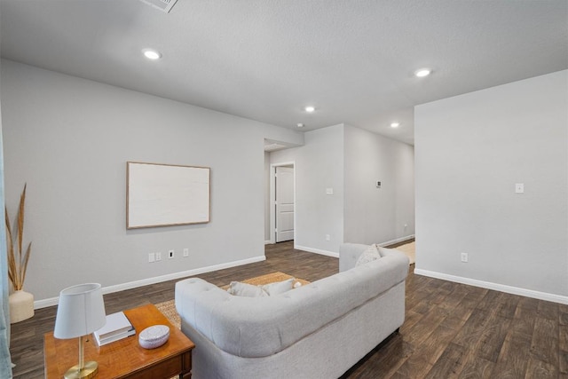 13921 Allan Shivers St, Manor, TX 78653 - living room with wood finished floors, baseboards, and recessed lighting