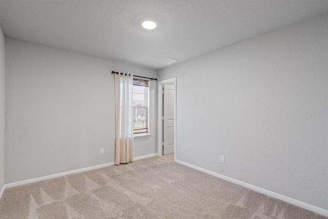 13921 Allan Shivers St, Manor, TX 78653 - spare room with light colored carpet and baseboards
