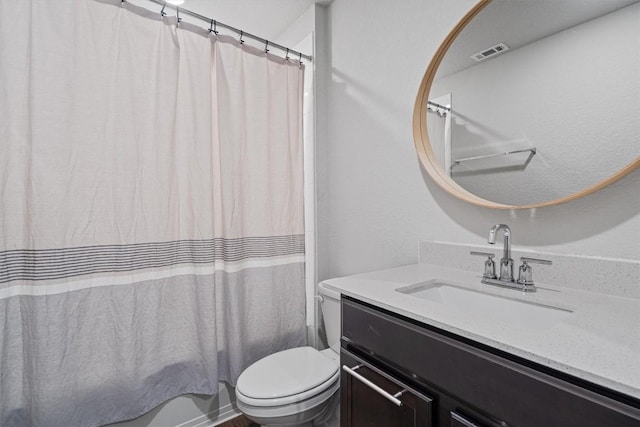 full bathroom featuring toilet, vanity, and shower / tub combo