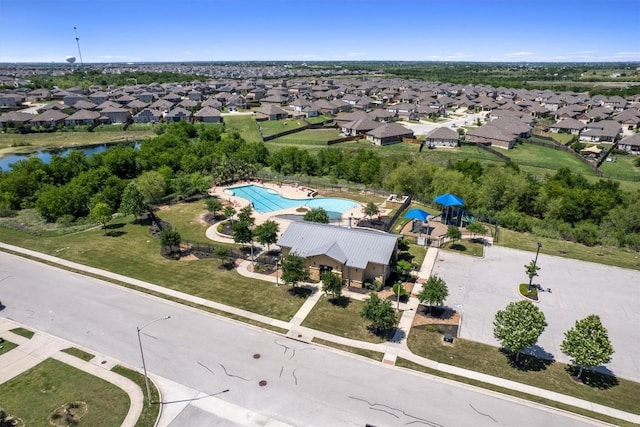 13921 Allan Shivers St, Manor, TX 78653 - aerial view of property and surrounding area with a pool area, nearby suburban area, and a nearby body of water
