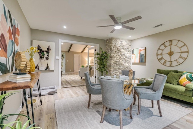 dining area with light wood finished floors, a ceiling fan, recessed lighting, and baseboards