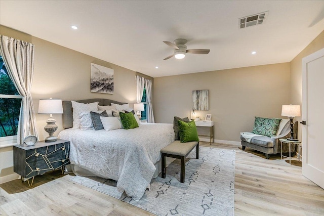 bedroom featuring wood finished floors, baseboards, a ceiling fan, and recessed lighting