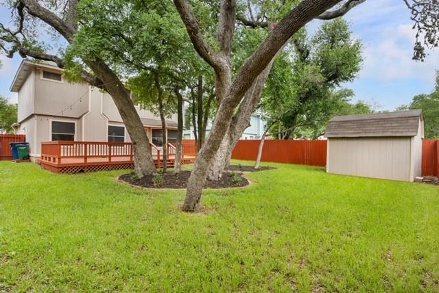 6200 La Naranja Ln, Austin, TX 78749 - view of yard with a storage shed, an outdoor structure, and a deck