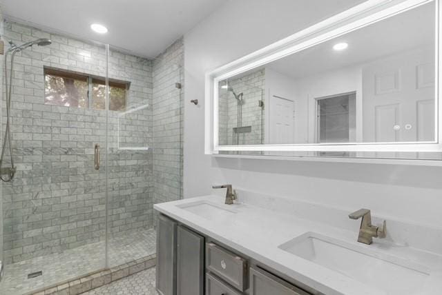 6200 La Naranja Ln, Austin, TX 78749 - full bathroom featuring a shower stall, double vanity, and recessed lighting