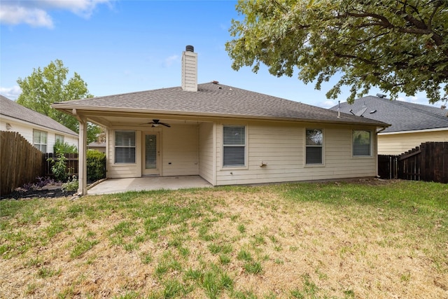 117 Village Commons Blvd, Georgetown, TX 78633 - rear view of property featuring a patio, a ceiling fan, and a chimney