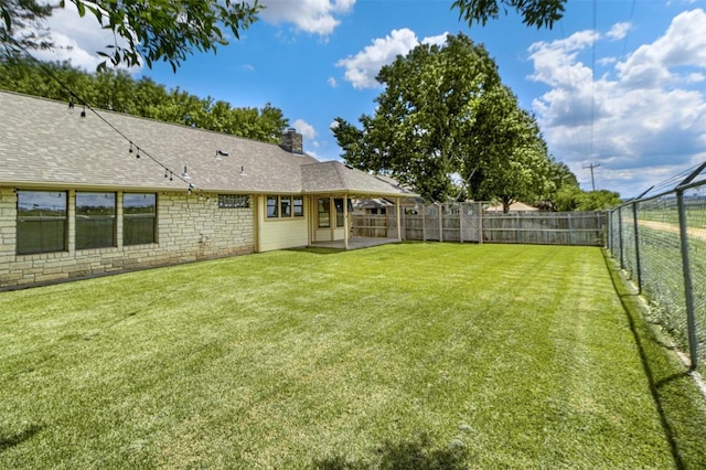 160 Turkey Run, Meadowlakes, TX 78654 - view of yard featuring a patio