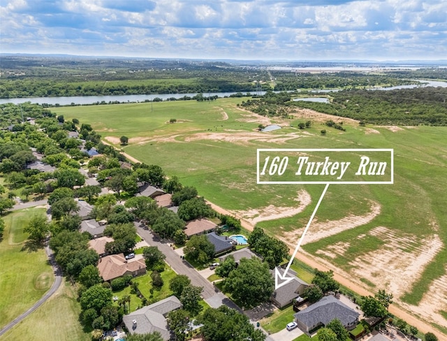 160 Turkey Run, Meadowlakes, TX 78654 - aerial view of residential area featuring a nearby body of water and a local golf course