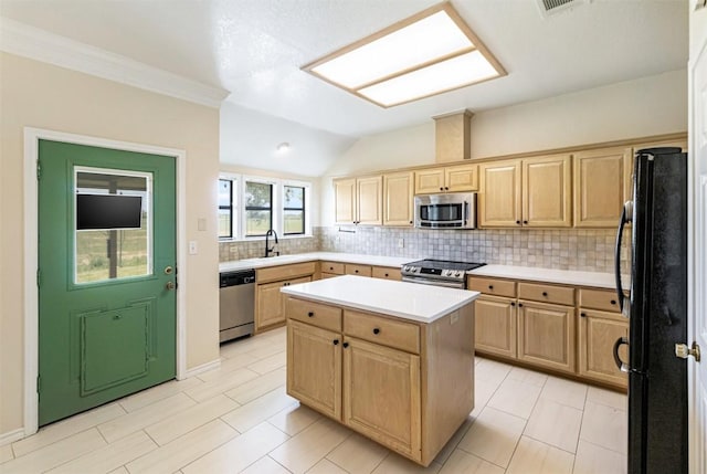 160 Turkey Run, Meadowlakes, TX 78654 - kitchen featuring stainless steel appliances, light brown cabinets, a sink, and lofted ceiling