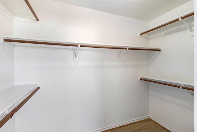 160 Turkey Run, Meadowlakes, TX 78654 - spacious closet featuring wood finished floors