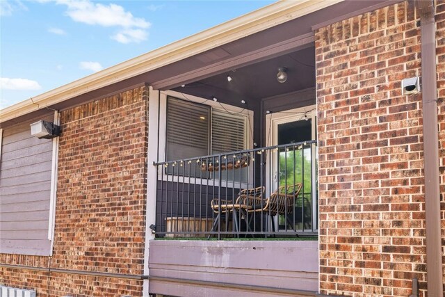 1840 Burton Dr Unit 110, Austin, TX 78741 - view of exterior entry with brick siding