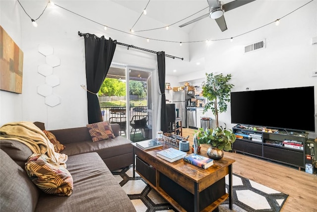 1840 Burton Dr Unit 110, Austin, TX 78741 - living area featuring a ceiling fan and wood finished floors