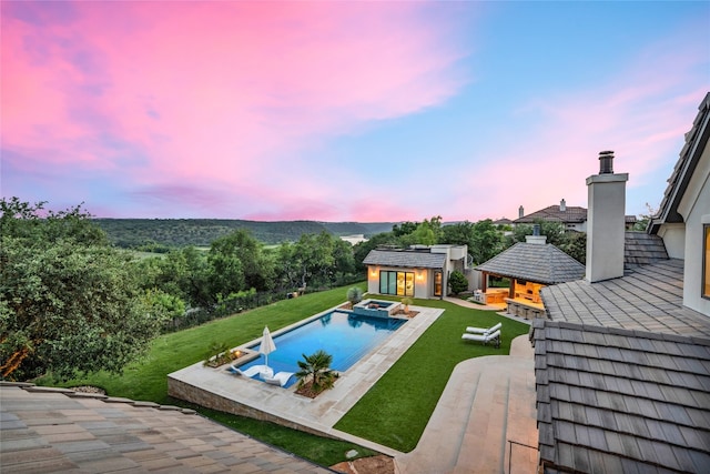 11705 Shoreview Overlook, Austin, TX 78732 - view of pool featuring an exterior structure, a lawn, an outdoor structure, and a patio