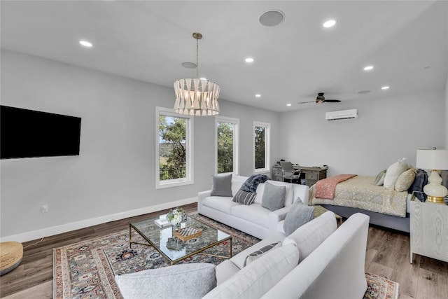 11705 Shoreview Overlook, Austin, TX 78732 - living area featuring recessed lighting, baseboards, wood finished floors, a ceiling fan, and an AC wall unit