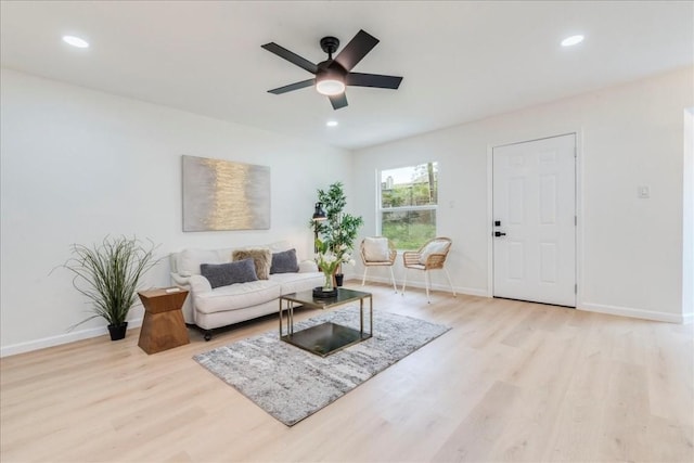 9606 Dallum Dr, Austin, TX 78753 - living room with light wood finished floors, a ceiling fan, baseboards, and recessed lighting