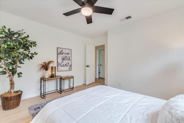 9606 Dallum Dr, Austin, TX 78753 - bedroom featuring wood finished floors and baseboards