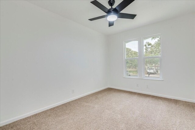 9606 Dallum Dr, Austin, TX 78753 - spare room featuring carpet floors, baseboards, and ceiling fan