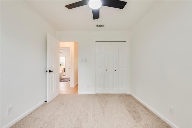 9606 Dallum Dr, Austin, TX 78753 - unfurnished bedroom with carpet, baseboards, a closet, and ceiling fan