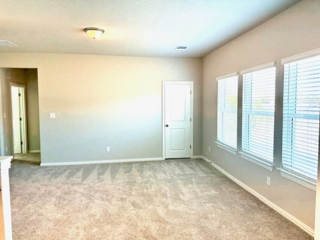 328 Milkwood Ter, Dripping Springs, TX 78620 - carpeted spare room with baseboards