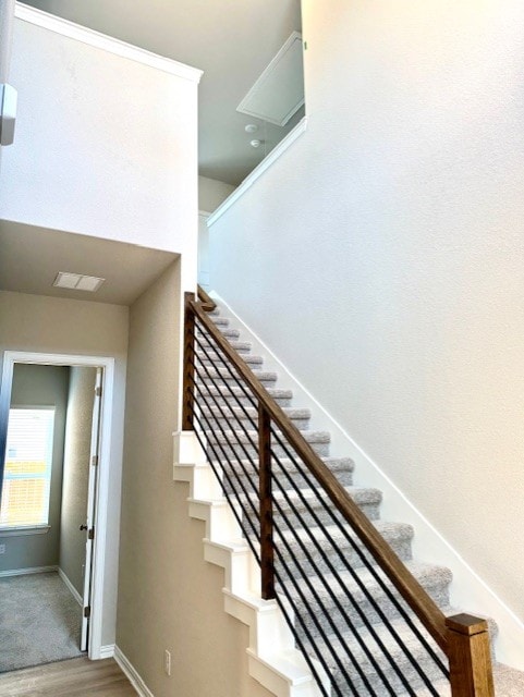 328 Milkwood Ter, Dripping Springs, TX 78620 - stairs with wood finished floors and baseboards