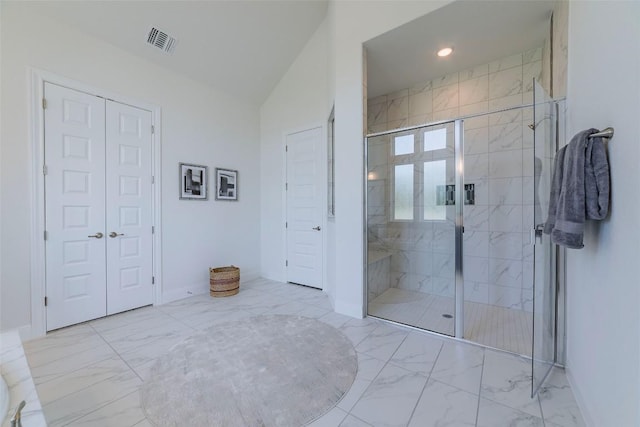 bathroom featuring marble look tiles, a shower stall, a closet, baseboards, and recessed lighting