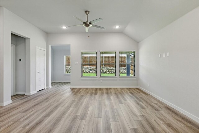 200 Hidalgo Ln, Elgin, TX 78621 - unfurnished living room featuring ceiling fan, light wood-type flooring, recessed lighting, baseboards, and lofted ceiling
