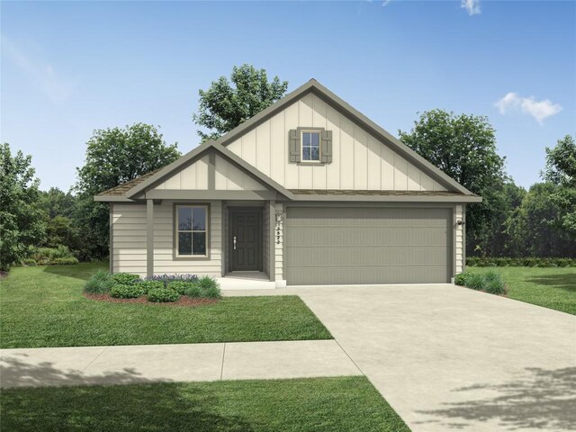 200 Hidalgo Ln, Elgin, TX 78621 - view of front facade featuring board and batten siding, a front lawn, concrete driveway, and a garage
