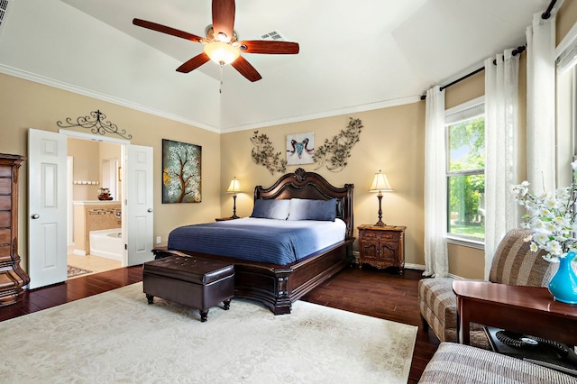 1720 Foxboro Ln, Cedar Park, TX 78613 - bedroom featuring dark wood finished floors, vaulted ceiling, baseboards, ensuite bath, and crown molding