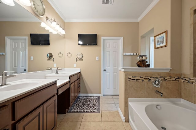 1720 Foxboro Ln, Cedar Park, TX 78613 - bathroom featuring a bath, crown molding, tile patterned floors, two vanities, and baseboards
