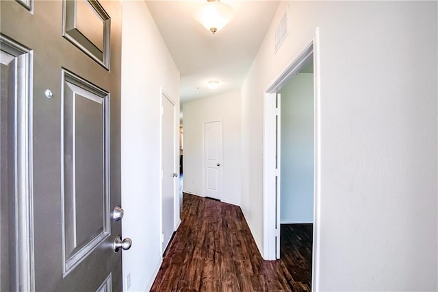 253 Beechnut Dr, Buda, TX 78610 - hall featuring dark wood-style flooring and baseboards