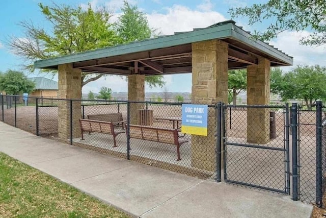 253 Beechnut Dr, Buda, TX 78610 - view of property's community featuring a gate and fence