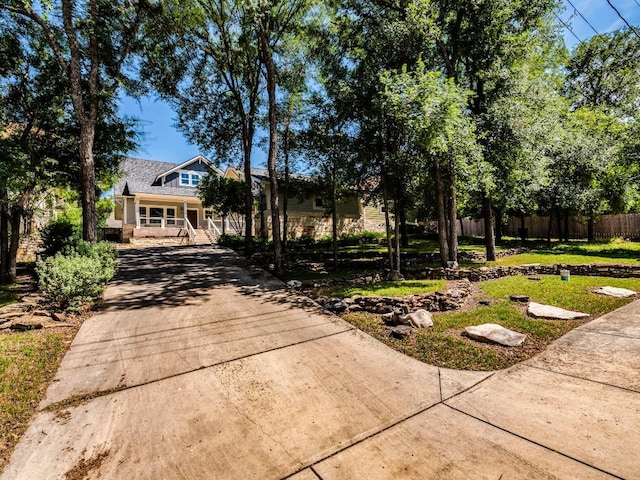 view of front of house featuring driveway and covered porch