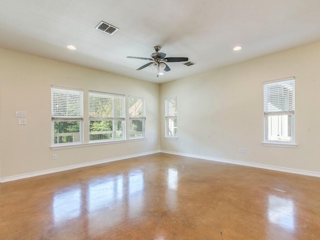 unfurnished room with concrete floors, baseboards, ceiling fan, and recessed lighting