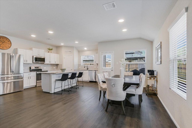 216 Xanadu Dr, Jarrell, TX 76537 - dining area featuring dark wood-style floors, recessed lighting, and baseboards