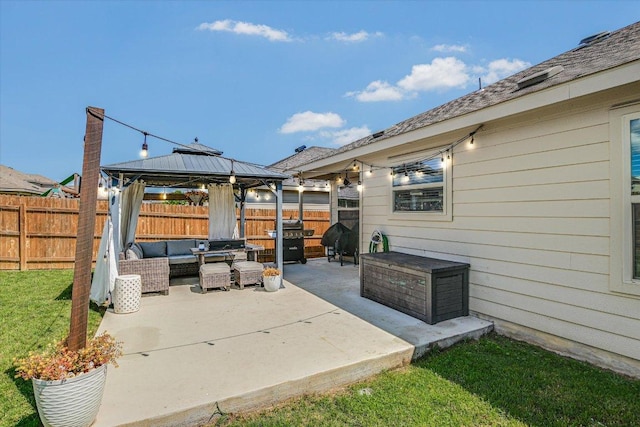 216 Xanadu Dr, Jarrell, TX 76537 - fenced backyard with an outdoor hangout area, a patio, and a gazebo