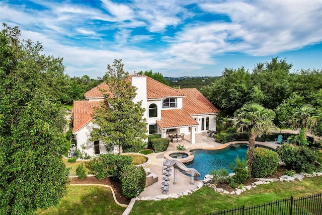 2116 Demona Dr, Austin, TX 78733 - view of pool with a patio area and a pool with connected hot tub